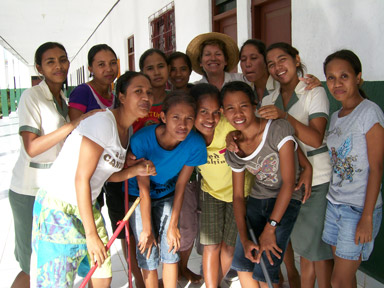 Palms Australia volunteer Ida Greenway with her students in Timor-Leste