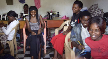 Women affected by HIV/AIDS learn dressmaking skills at KIFAD, Uganda