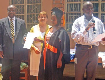 Lorrain (second from left) and Bob (far right) at KIFAD's graduation, Uganda