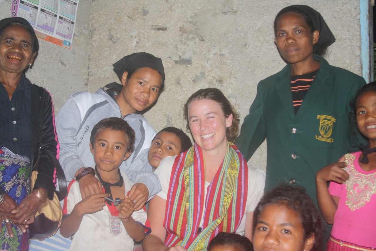 Palms Australia volunteer Donna with Rosita and her family in Timor-Leste