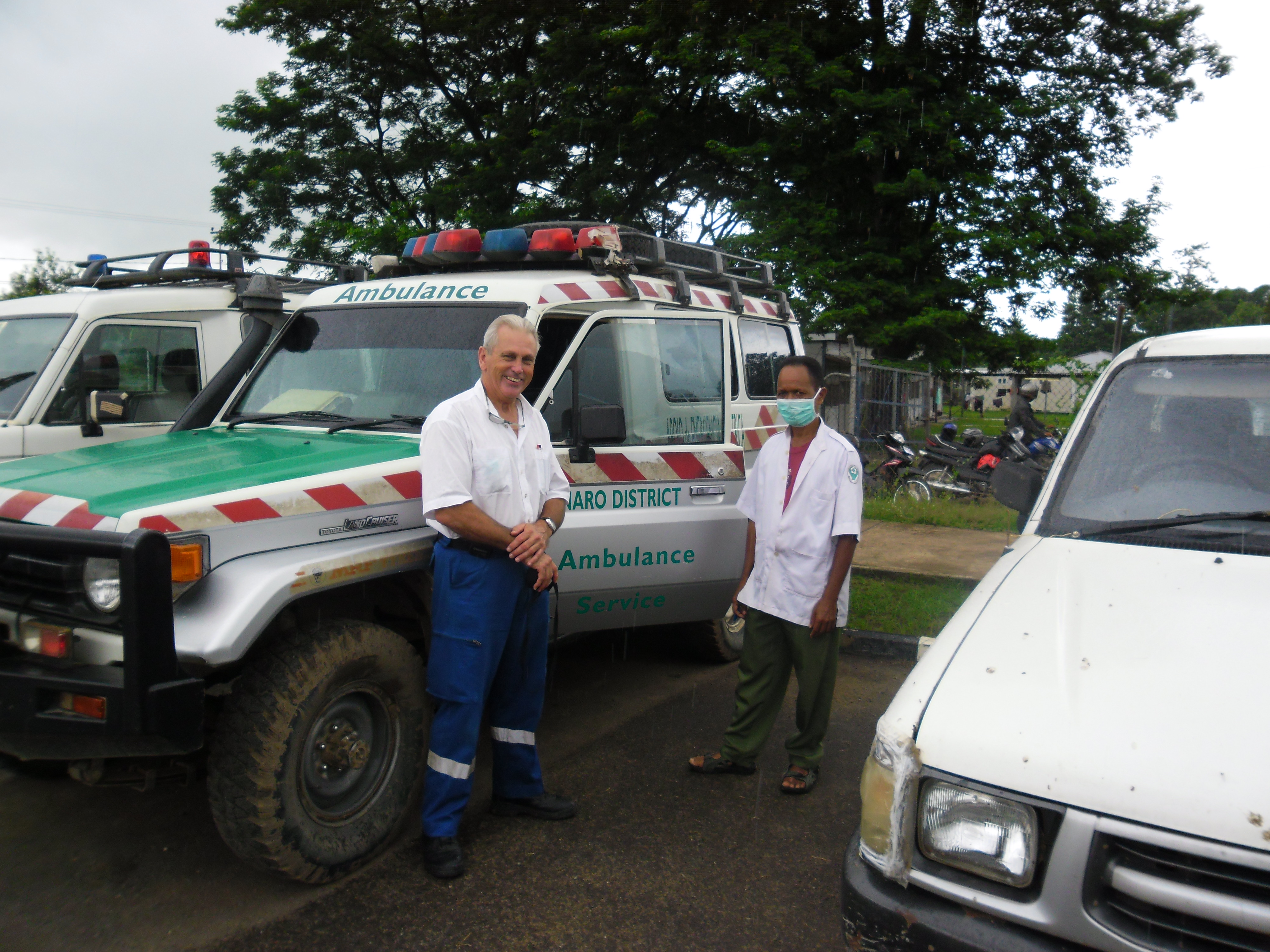 Palms Australia volunteer Roger and Carlos with Maliana's Ambulance