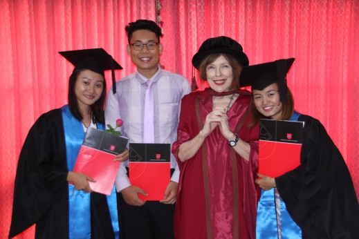 Graduates Eh Tah Mee, Aung Aung Myat and Maybel Htoo with Rosaleen