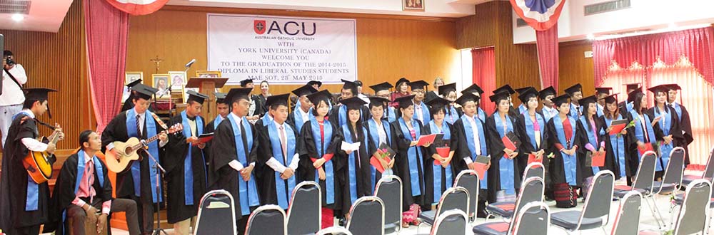 Graduates singing at Australian Catholic University Mae Sot graduation