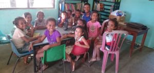 Classroom with volunteer and local children in Timor-Leste